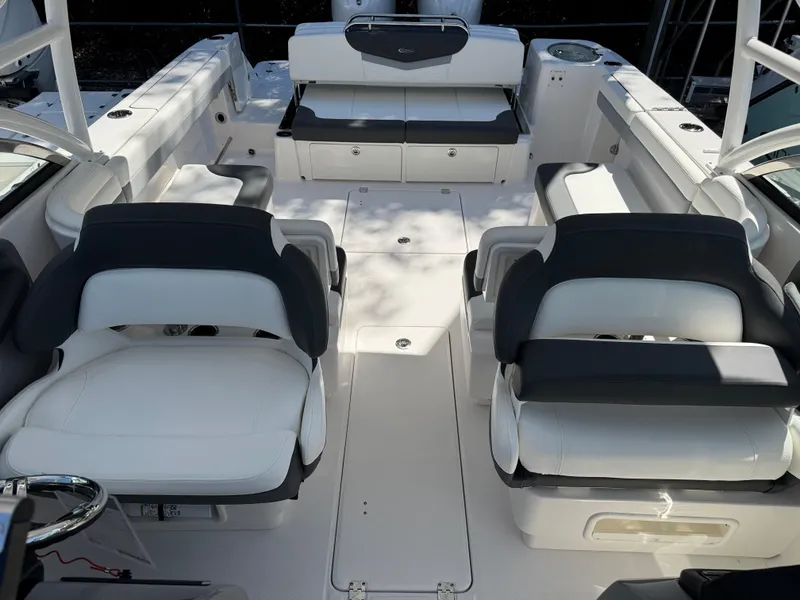 Slide: The Image of 2024 Robalo R317 boat interior with spacious seating and modern design. - 43