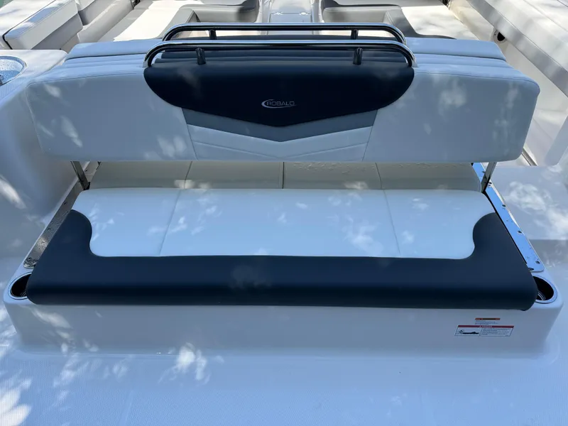 Slide: The Image of 2024 Robalo R317 boat seating area with sleek, modern design and comfortable upholstery. - 49