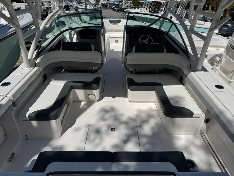 Slide: The Image of 2024 Robalo R317 boat interior with spacious seating and modern design. - 6