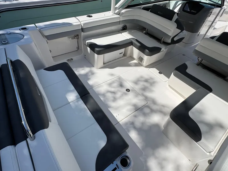 Slide: The Image of 2024 Robalo R317 boat interior with spacious seating and modern design. - 7