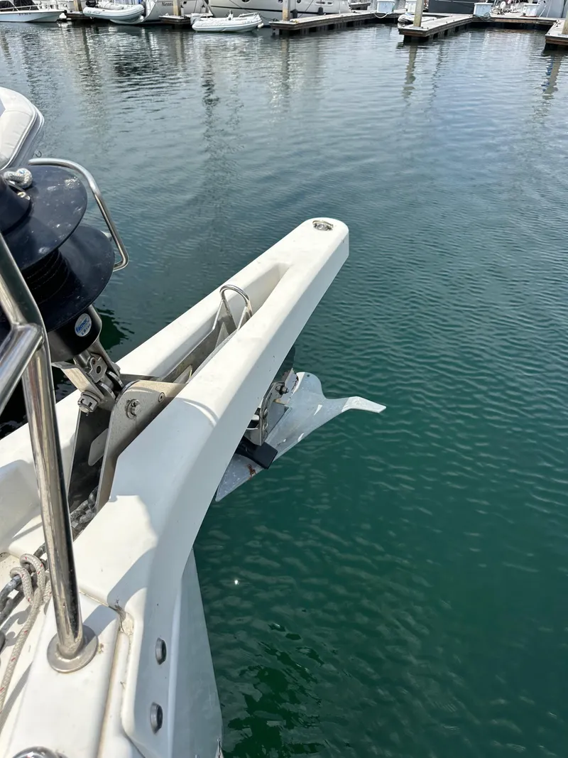 Slide: The Image of Jeanneau Sun Odyssey 410 yacht bow with anchor, docked in marina, 2020 model. - 31