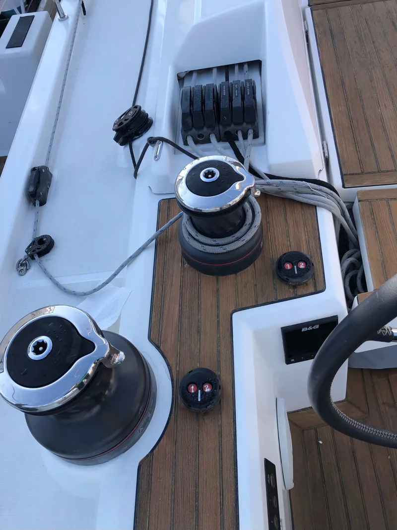 Slide: The Image of Cockpit of 2019 Beneteau Oceanis 51.1 yacht with winches and control panels. - 14