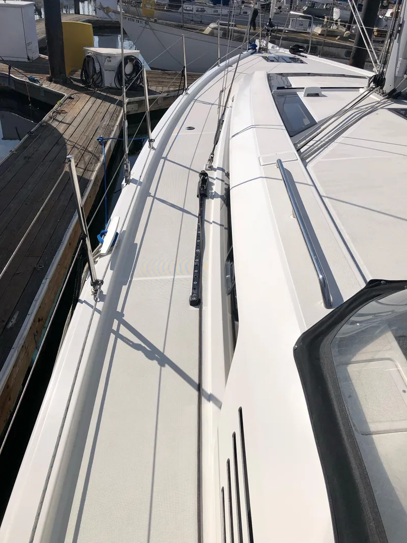Slide: The Image of 2019 Beneteau Oceanis 51.1 yacht deck, docked at marina. - 16