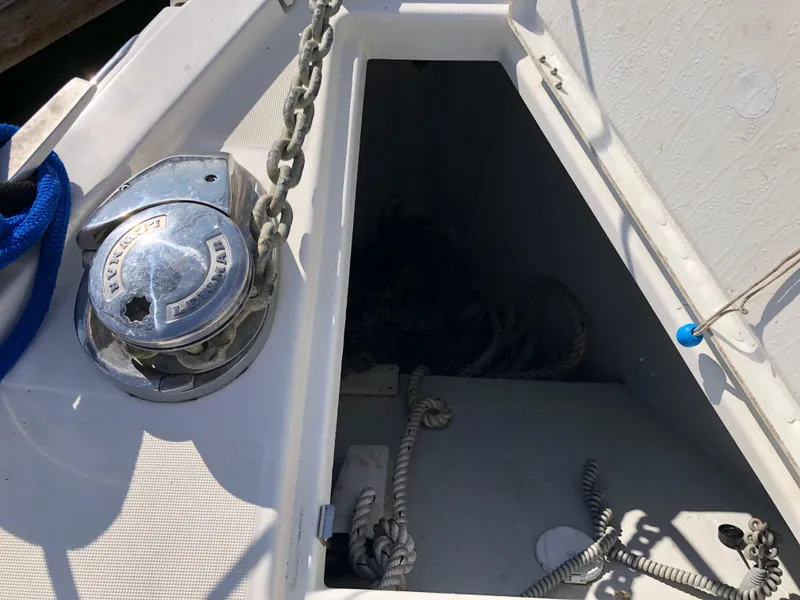Slide: The Image of 2019 Beneteau Oceanis 51.1 anchor locker with chain and winch. - 19