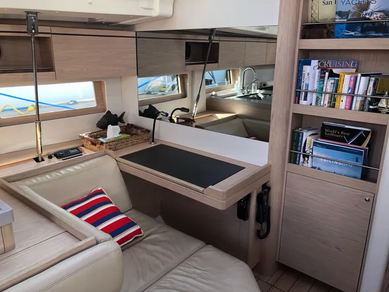 Slide: The Image of Interior of 2019 Beneteau Oceanis 51.1 yacht with modern design and cozy seating area. - 29