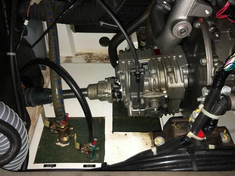 Slide: The Image of Engine compartment of a 2019 Beneteau Oceanis 51.1 sailboat, showcasing mechanical components. - 37
