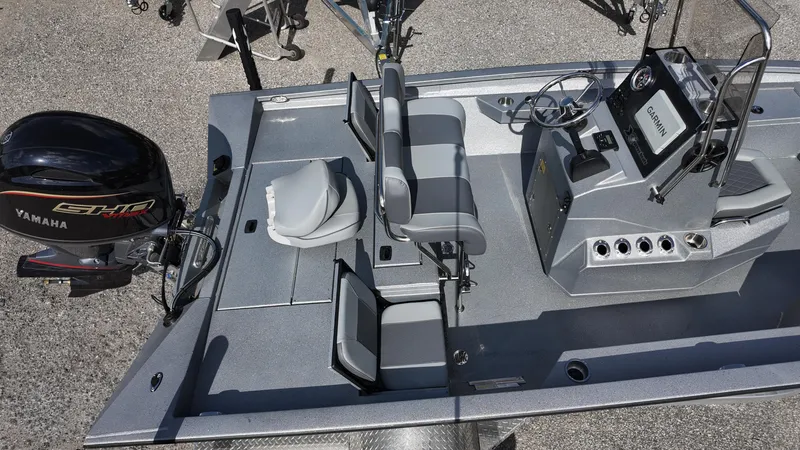 Slide: The Image of 2025 Xpress H20B boat with Yamaha engine, featuring sleek seating and modern console design. - 22