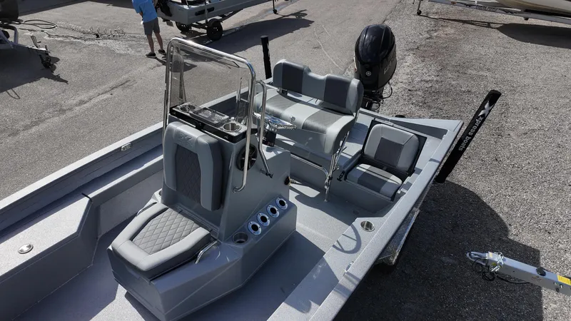 Slide: The Image of 2025 Xpress H20B boat with sleek design and modern seating arrangement. - 28
