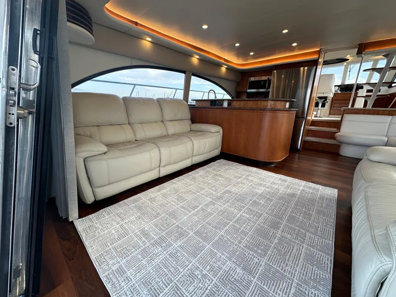 Slide: The Image of Luxurious interior of 2004 Meridian 580 Pilothouse yacht with leather seating and modern design. - 42