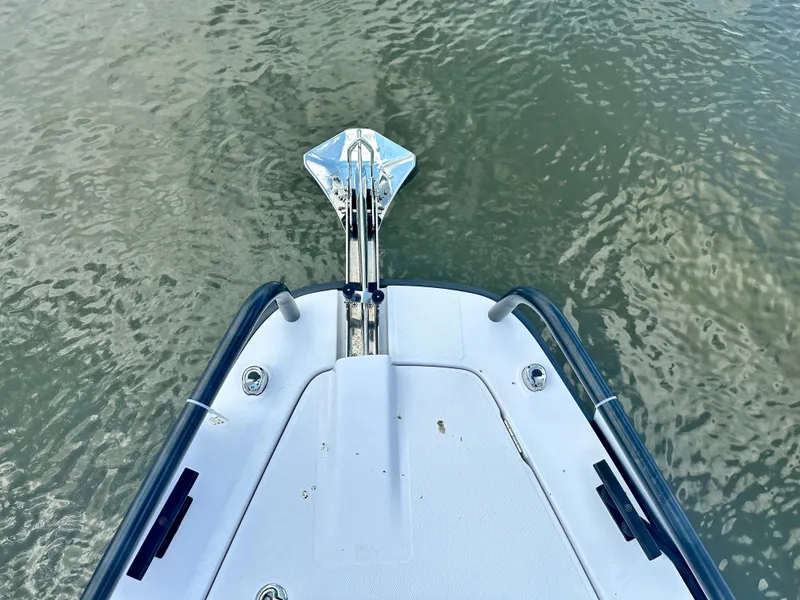 Slide: The Image of Bow view of 2022 Axopar 37 XC Cross Cabin BRABUS LINE on water. - 17