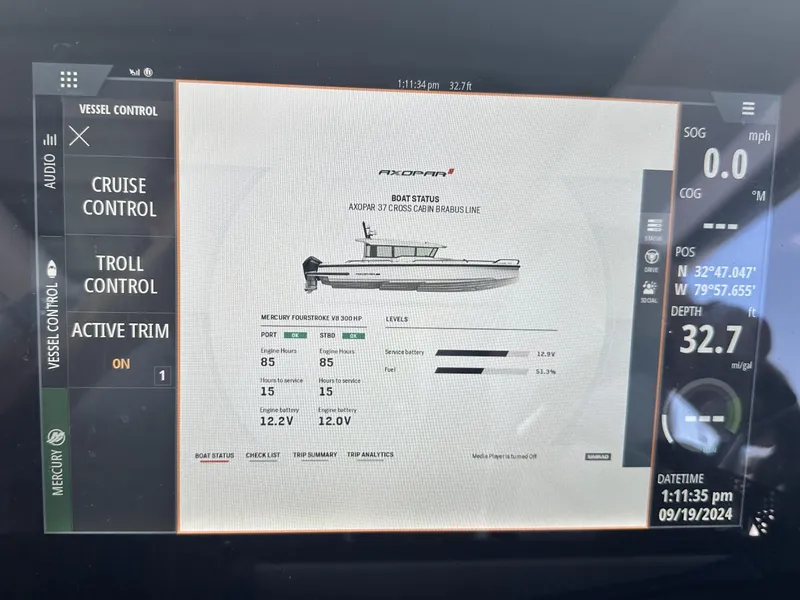Slide: The Image of Dashboard display of a 2022 Axopar 37 XC Cross Cabin BRABUS LINE boat. - 28