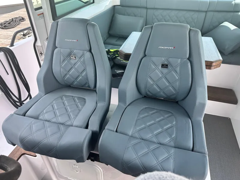 Slide: The Image of Luxurious seating in 2022 Axopar 37 XC Cross Cabin BRABUS LINE boat interior. - 29
