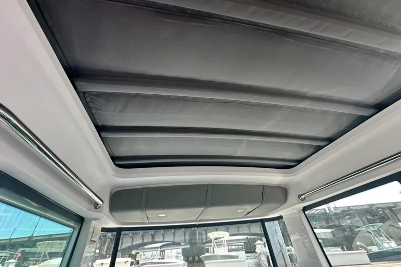 Slide: The Image of Interior view of 2022 Axopar 37 XC CROSS CABIN roof and windows. - 34