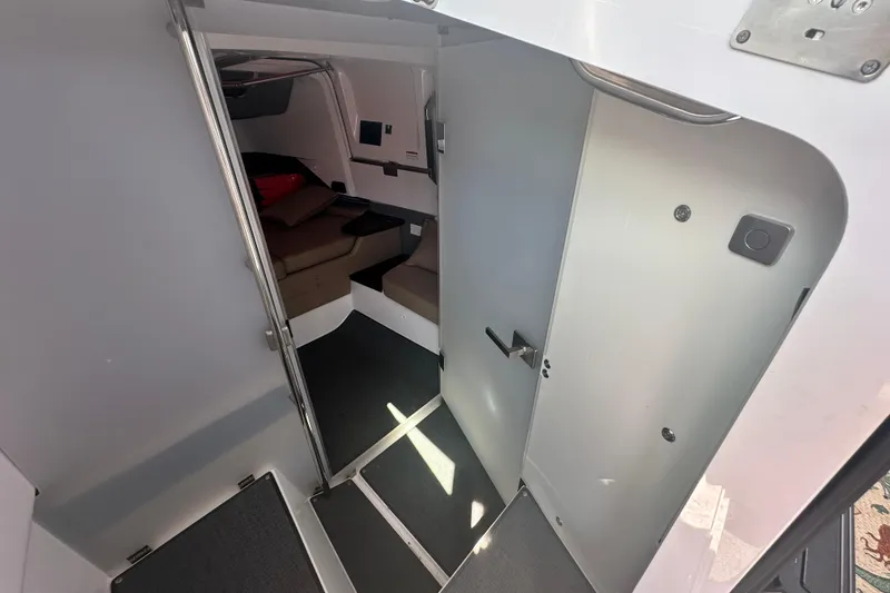 Slide: The Image of Interior view of 2022 Axopar 37 XC CROSS CABIN, featuring modern cabin design. - 39