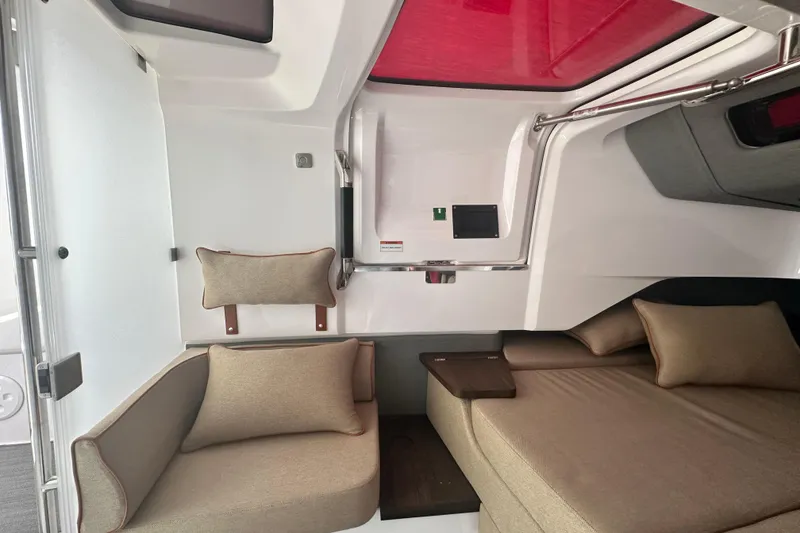 Slide: The Image of Interior of 2022 Axopar 37 XC CROSS CABIN with cozy seating and modern design. - 44