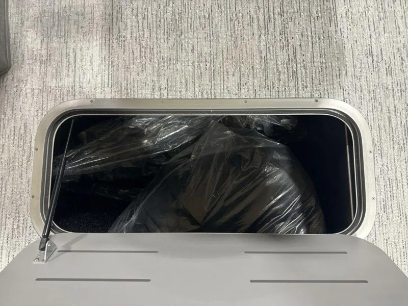 Slide: The Image of Storage compartment of 2025 Bennington R Bowrider Swingback 24 RTSB boat. - 19