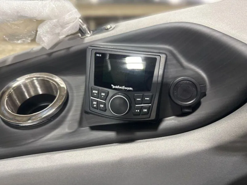 Slide: The Image of Control panel of 2025 Bennington R Bowrider Swingback 24 RTSB with Rockford Fosgate audio system. - 20