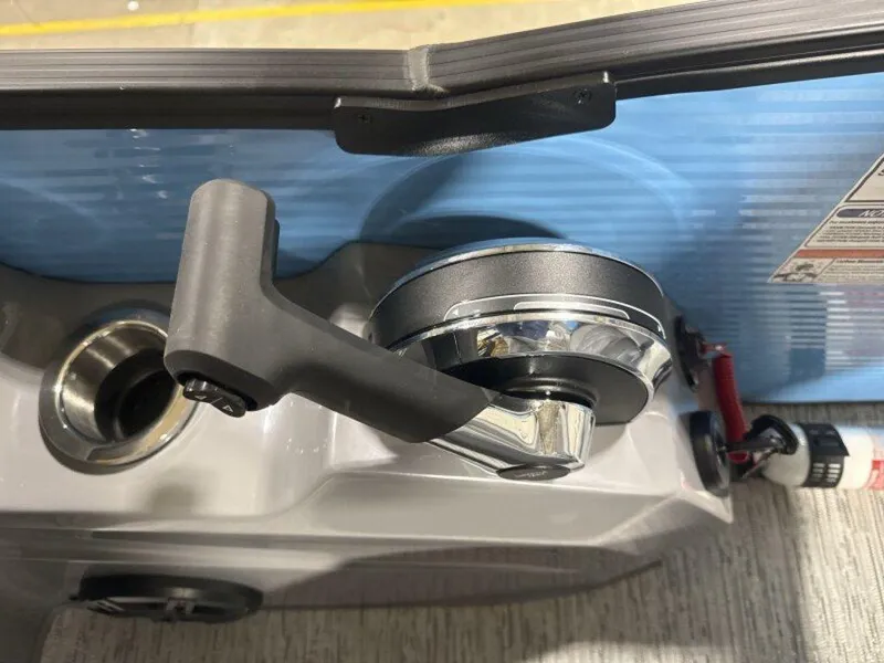 Slide: The Image of 2025 Bennington R Bowrider Swingback 24 RTSB boat control lever and panel detail. - 24