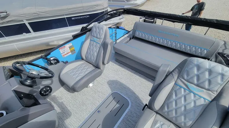 Slide: The Image of 2025 Bennington R Bowrider Swingback 24 RTSB interior with luxurious seating and modern design. - 28