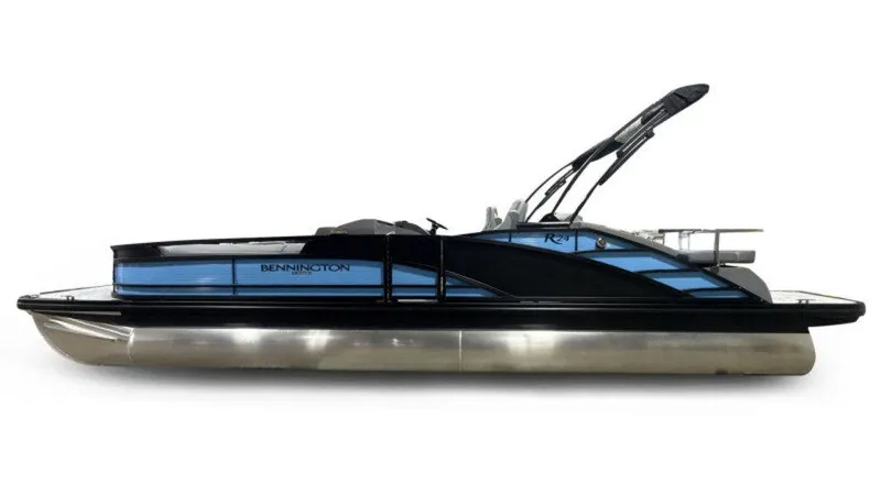 Slide: The Image of 2025 Bennington R Bowrider Swingback 24 RTSB pontoon boat, sleek design, side view. - 4