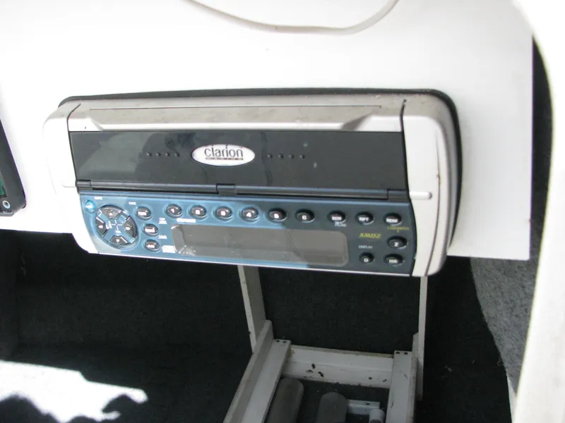 Slide: The Image of Clarion stereo system in a 2003 Sea Ray 240 Sundeck boat. - 14