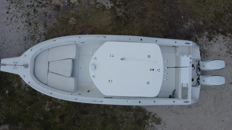 Slide: The Image of Overhead view of a 1997 Stamas 290 Tarpon boat on land. - 6