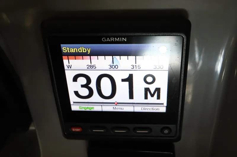 Slide: The Image of Garmin navigation display on 2016 Robalo R265 Walkaround showing heading 301 degrees. - 35