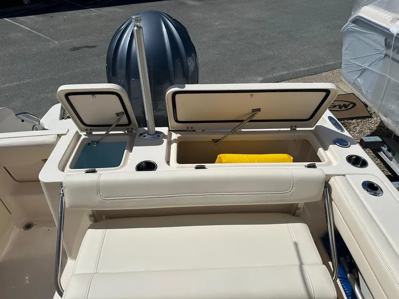 Slide: The Image of 2022 Grady-White 236 Fisherman boat with open storage compartments and seating. - 13