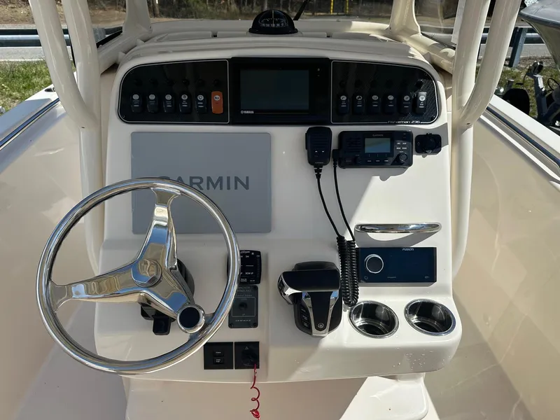 Slide: The Image of 2022 Grady-White 236 Fisherman boat console with Garmin navigation and control panel. - 4