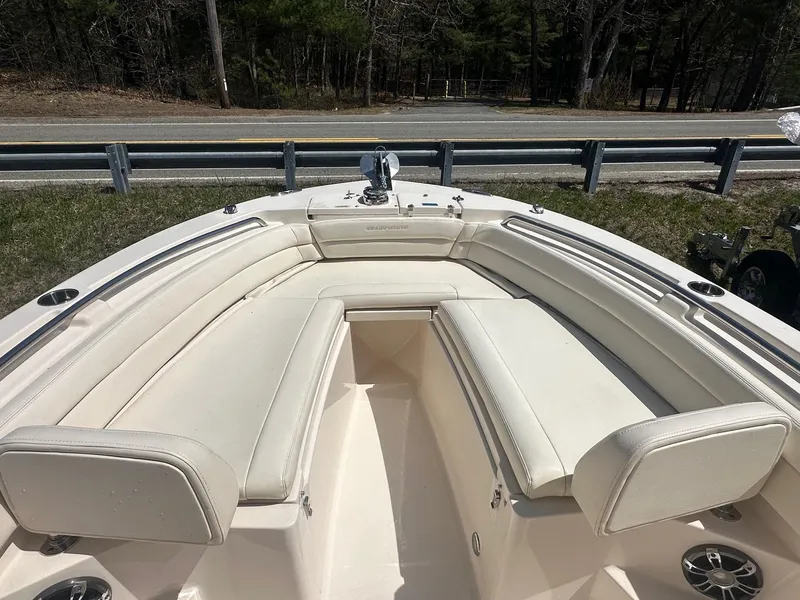 Slide: The Image of 2022 Grady-White 236 Fisherman boat with cushioned seating and stainless steel fixtures. - 6