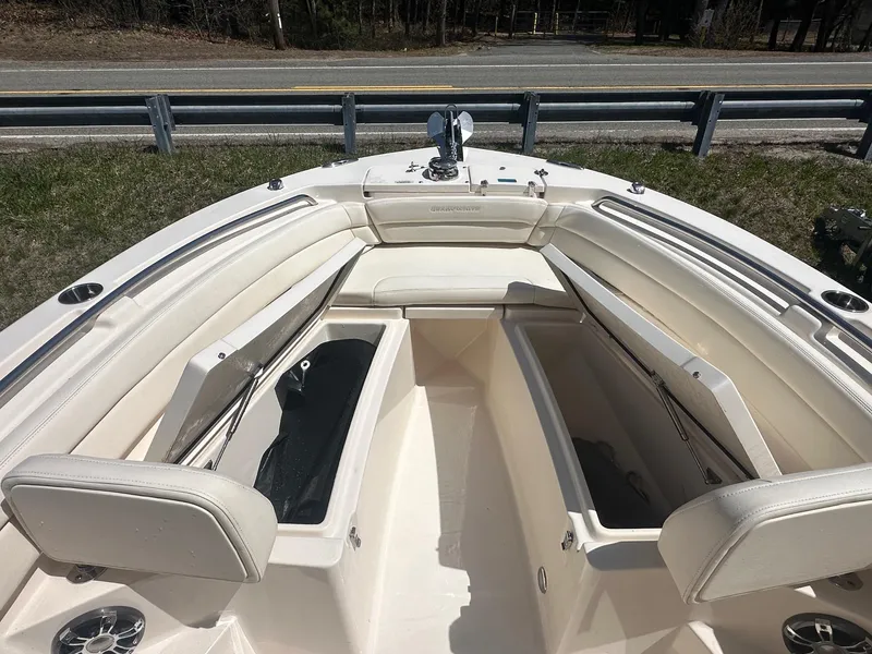 Slide: The Image of 2022 Grady-White 236 Fisherman boat interior with open storage compartments. - 7