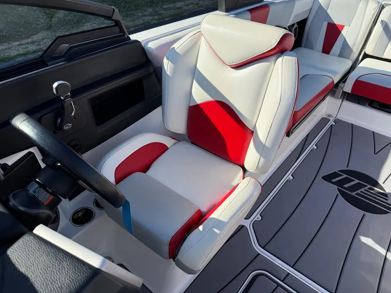 Slide: The Image of 2021 Malibu Wakesetter 23 LSV interior with red and white seating, sleek design. - 13