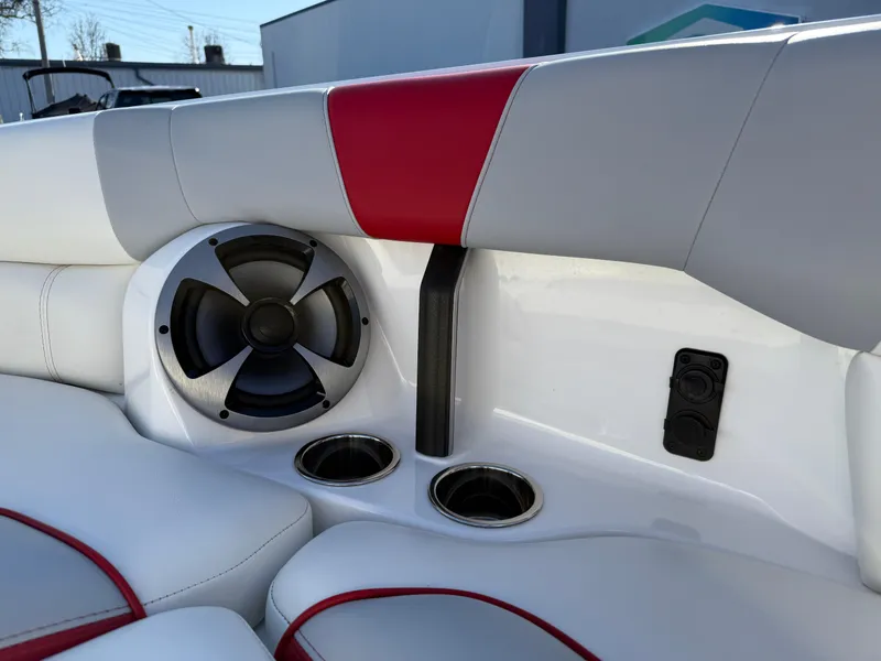 Slide: The Image of Interior of 2021 Malibu Wakesetter 23 LSV with speaker and cup holders. - 25