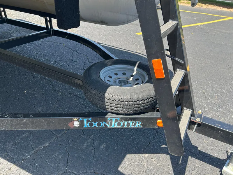 Slide: The Image of Trailer with spare tire for 2020 SunChaser Vista 18 Fish boat. - 15