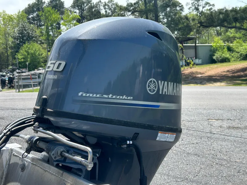 Slide: The Image of Yamaha 50 horsepower four-stroke outboard motor on a 2020 SunChaser Vista 18 Fish boat. - 4