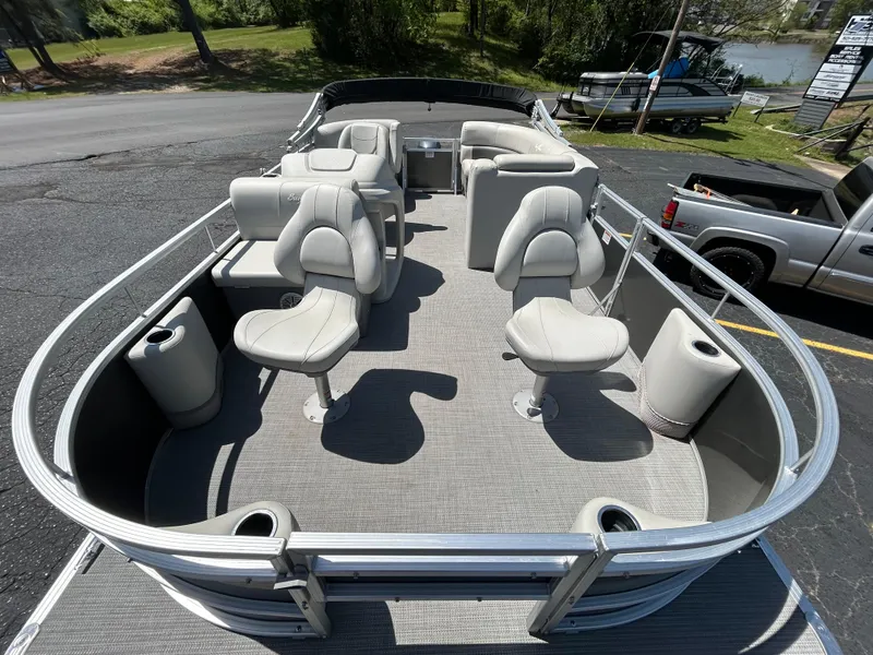 Slide: The Image of 2020 SunChaser Vista 18 Fish pontoon boat with spacious seating and fishing setup. - 7