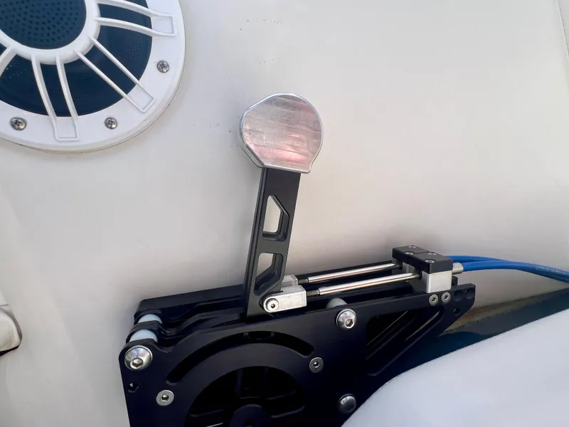 Slide: The Image of Boat throttle control lever on Skater 32B, 2001 model, with speaker in background. - 15