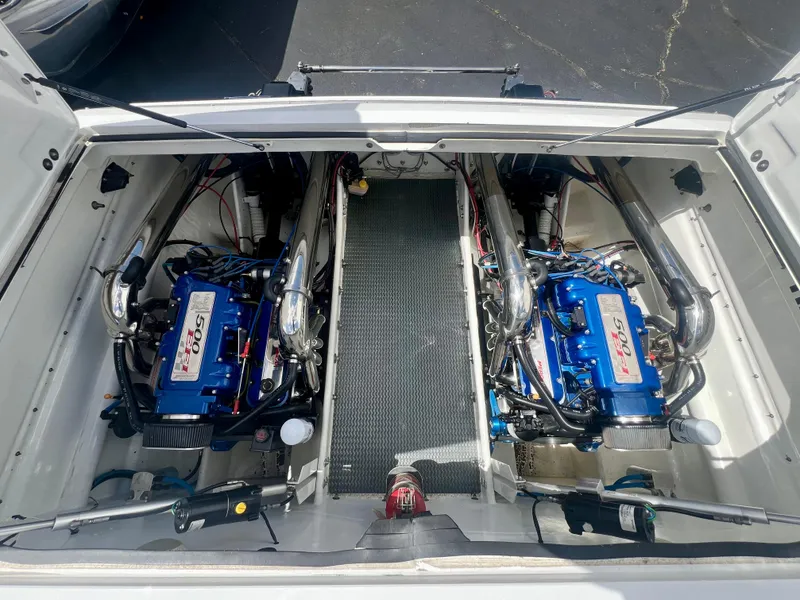 Slide: The Image of Twin blue engines in a 2001 Skater 32B boat engine compartment. - 22