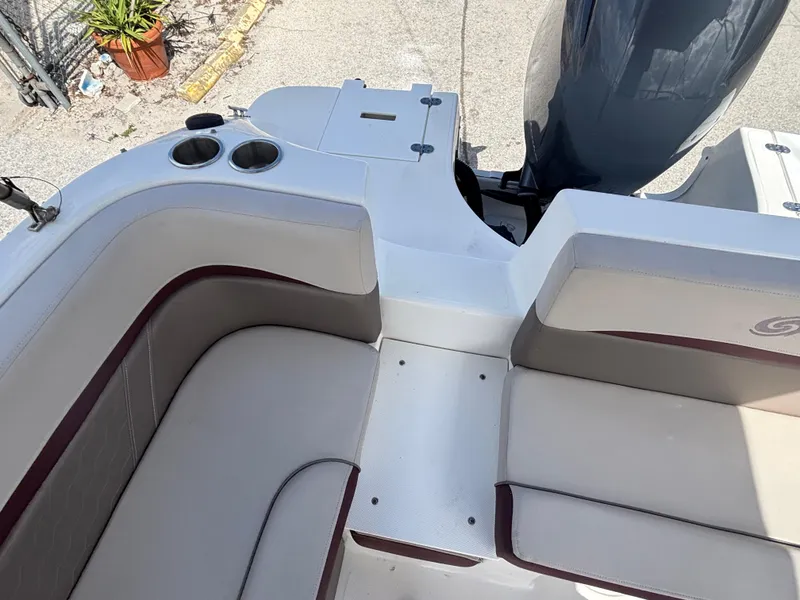 Slide: The Image of 2019 Hurricane SD217 boat interior with seating and cup holders. - 21