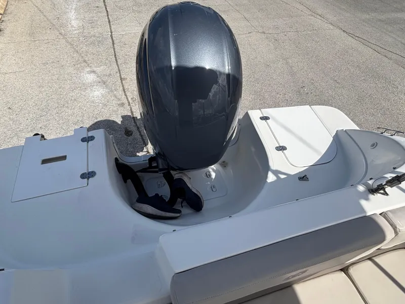 Slide: The Image of 2019 Hurricane SD217 boat with outboard motor on a sunny day. - 22