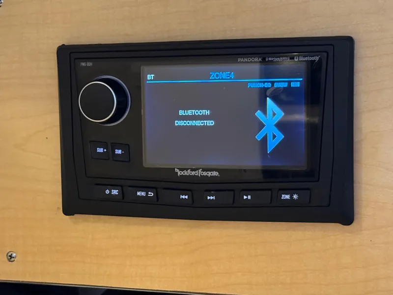 Slide: The Image of Rockford Fosgate stereo system with Bluetooth, Sea Ray 340 Sundancer 1999, displaying "Bluetooth Disconnected." - 35