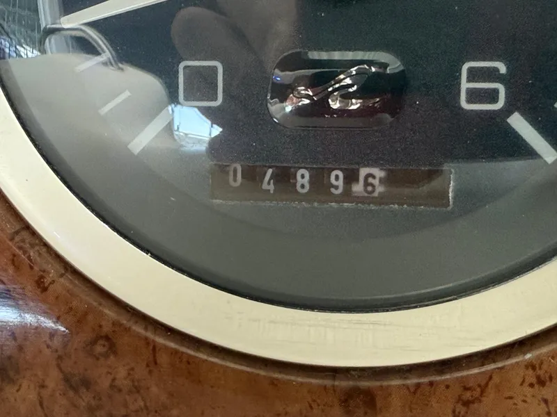 Slide: The Image of Close-up of a 1999 Sea Ray 340 Sundancer odometer reading 4896 hours. - 41