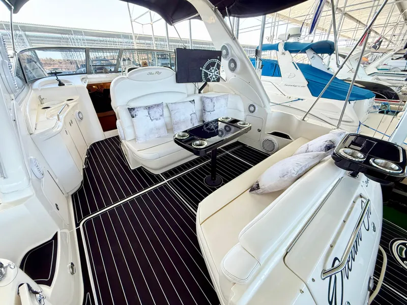 Slide: The Image of Luxurious 1999 Sea Ray 340 Sundancer yacht interior with plush seating and elegant design. - 9