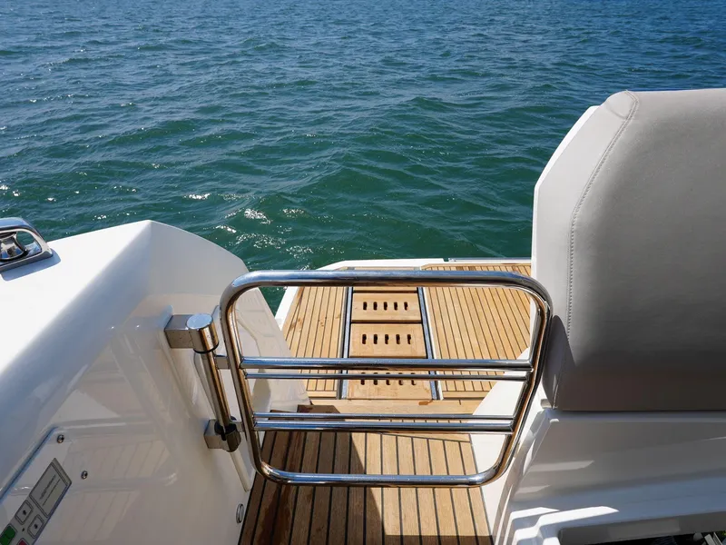 Slide: The Image of 2019 Prestige 520S yacht deck with stainless steel railing and ocean view. - 33