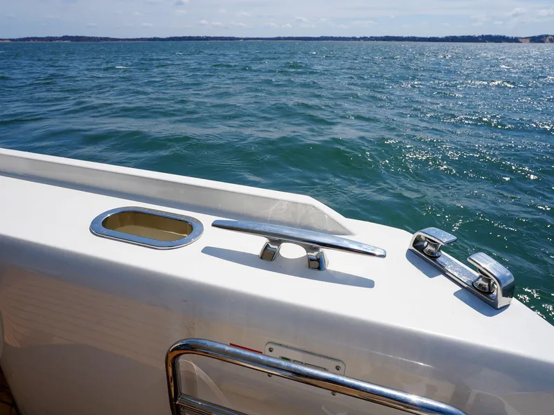 Slide: The Image of 2019 Prestige 520S yacht railing with ocean view in the background. - 34