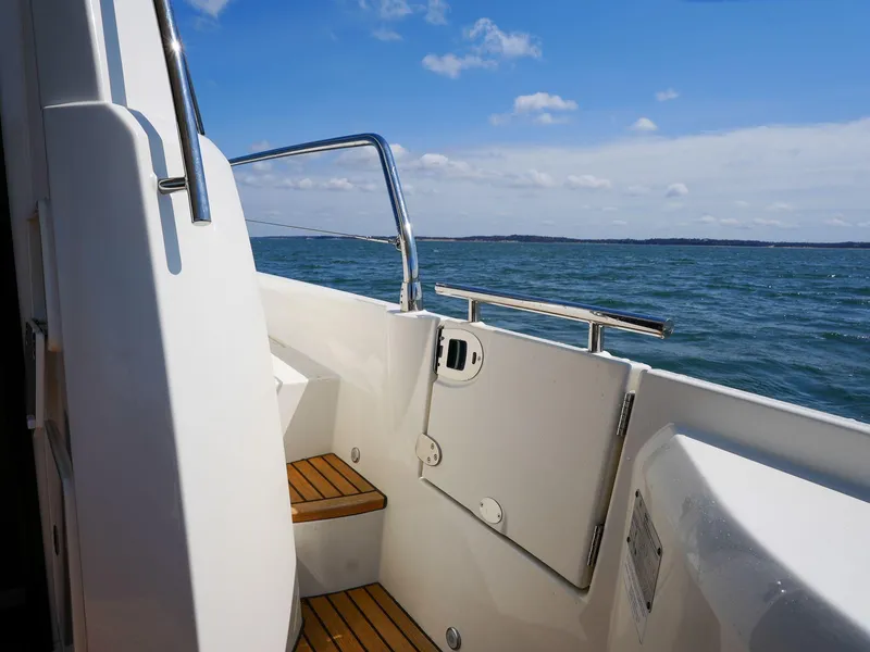 Slide: The Image of 2019 Prestige 520S yacht deck with ocean view and clear blue sky. - 35