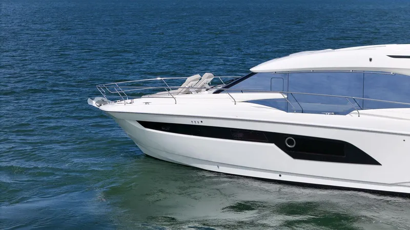 Slide: The Image of 2019 Prestige 520S yacht cruising on open water. - 44