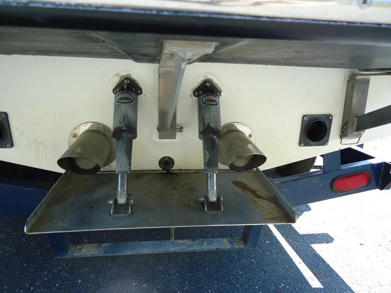 Slide: The Image of Rear view of a 2009 Calabria Pro V II boat with exhaust pipes and trim tabs. - 14