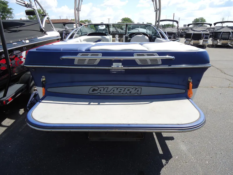 Slide: The Image of 2009 Calabria Pro V II boat, rear view, parked in a marina. - 15