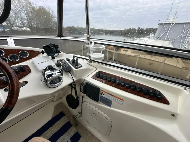 Slide: The Image of Helm of 2008 Meridian 391 Sedan yacht with controls and navigation equipment. - 15